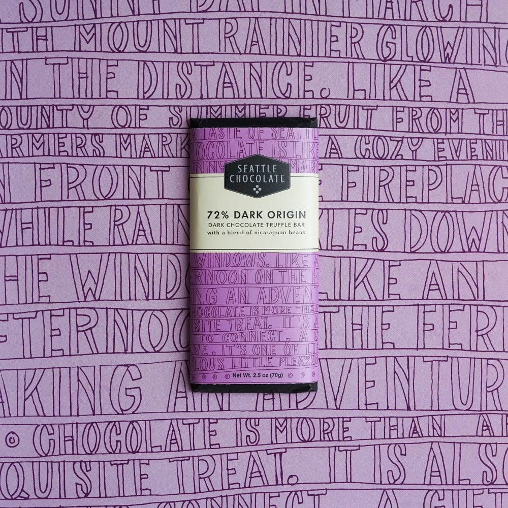 Seattle Chocolate 72% Dark Origin Dark Chocolate Truffle Bar on a purple background