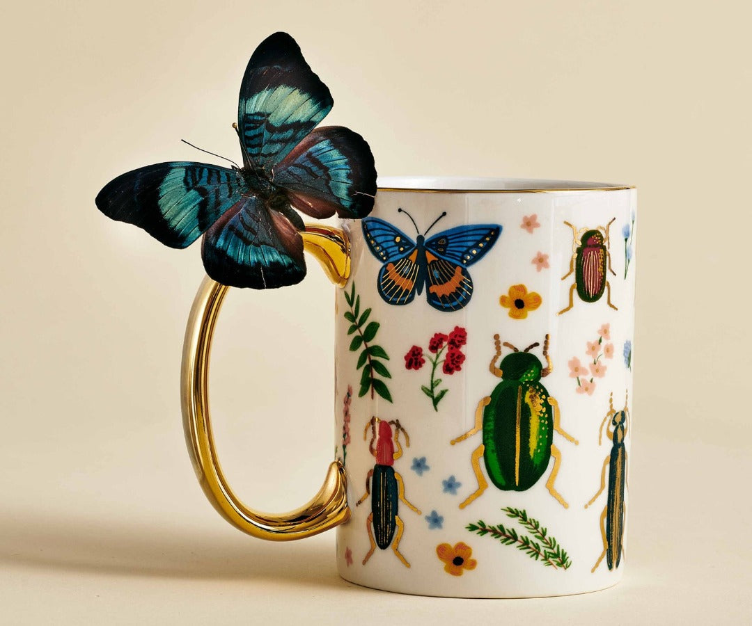 Curio Illustrated Gold Foil Porcelain Mug Lifestyle with Butterfly