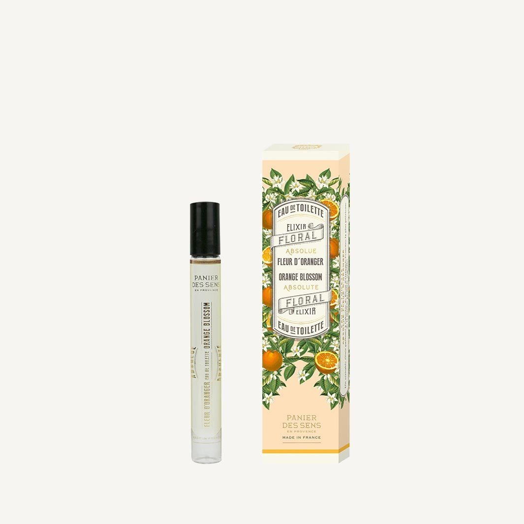 Eau de Toilette Roll-On Perfume in Orange Blossom comes in a glass bottle in a floral box